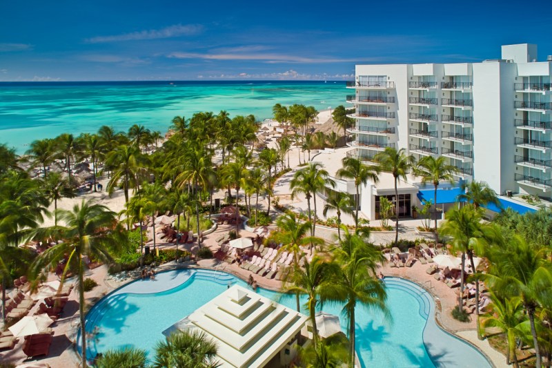 Aruba Marriott Resort aerial shot with pool and Palm beach in the background. 