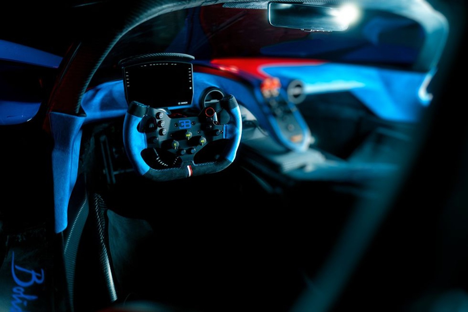 Bugatti Bolide Concept interior focusing on steering wheel.