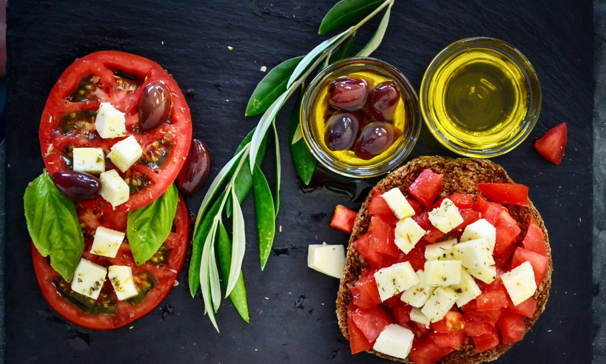 A mouthwatering tomato salad with olive oil.