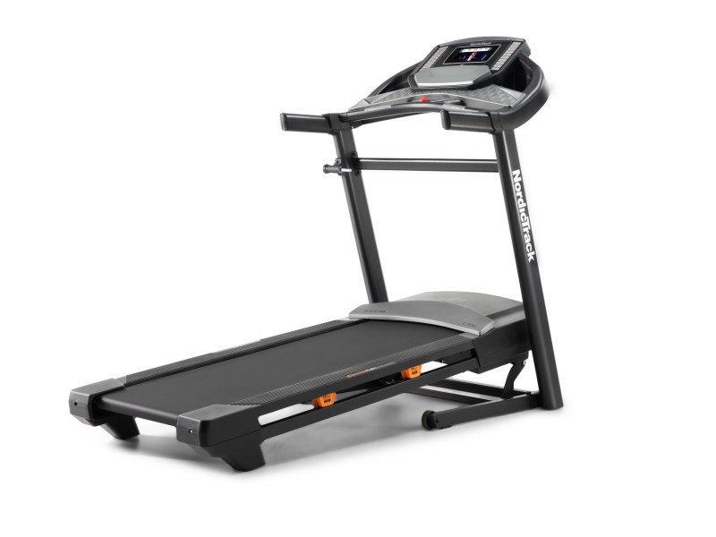 NordicTrack C700 Folding Treadmill with 7-inch touchscreen display on white background.