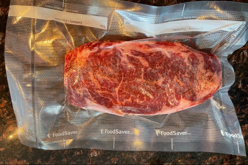 vacuum packed wagyu strip steak ready for sous vide.