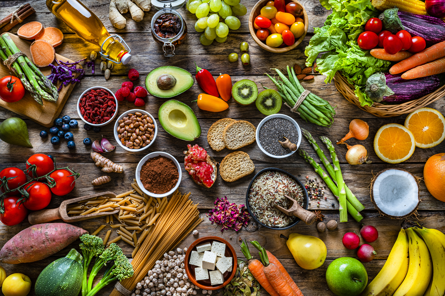 A bird's eye view of healthy foods on a table.