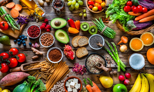 A bird's-eye view of healthy foods on a table.