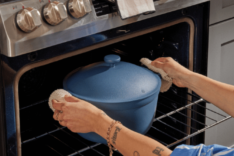 A blue Perfect Pot emerging from the oven.