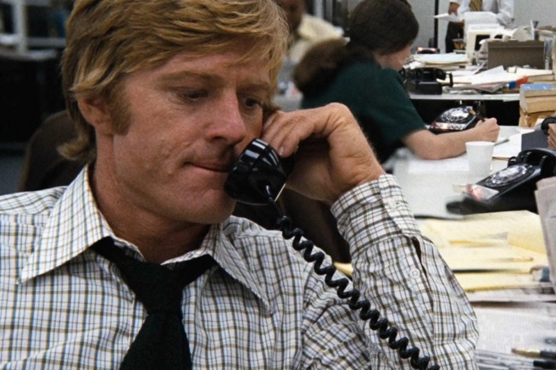 Robert Redford in All the President's Men answering the telephone.