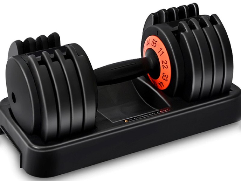 The Skonyon Adjustable Dumbbell in black, with an orange label for the weights.