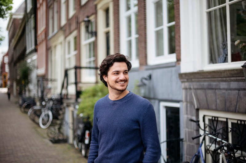 young handsome man on the streets of Amsterdam.