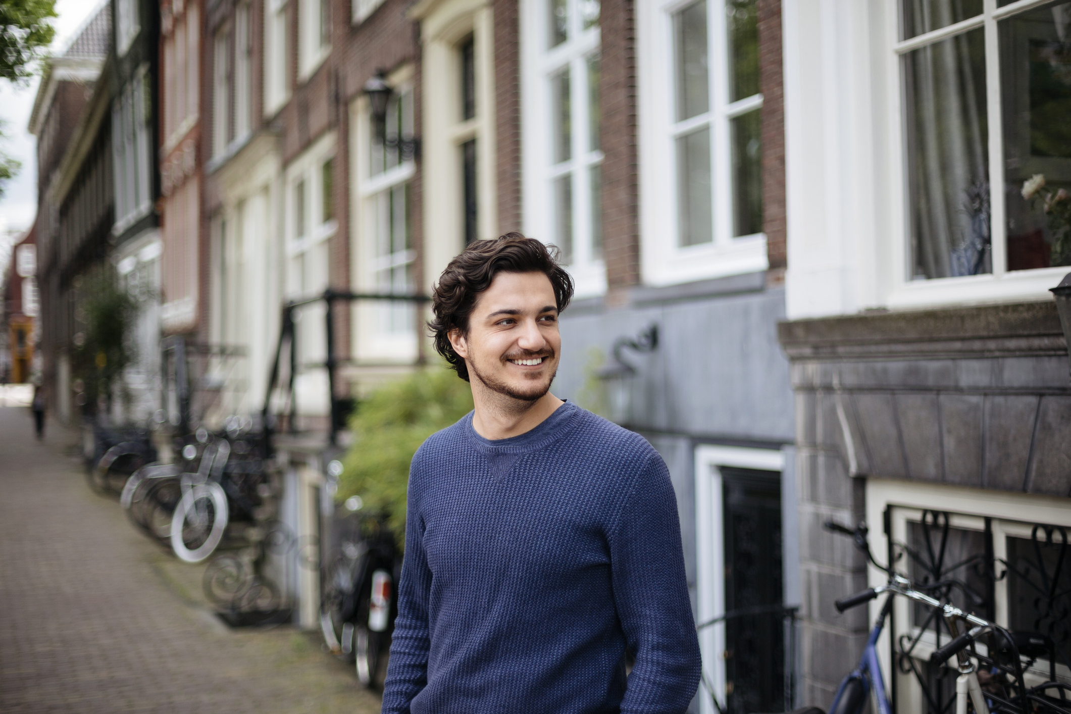 young handsome man on the streets of Amsterdam.