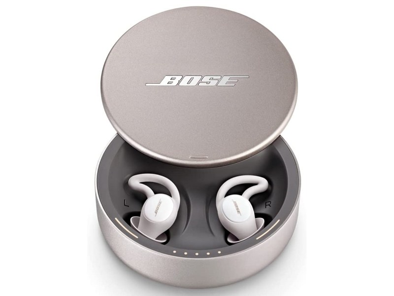 The Bose Sleepbuds II wireless earbuds inside their charging case.