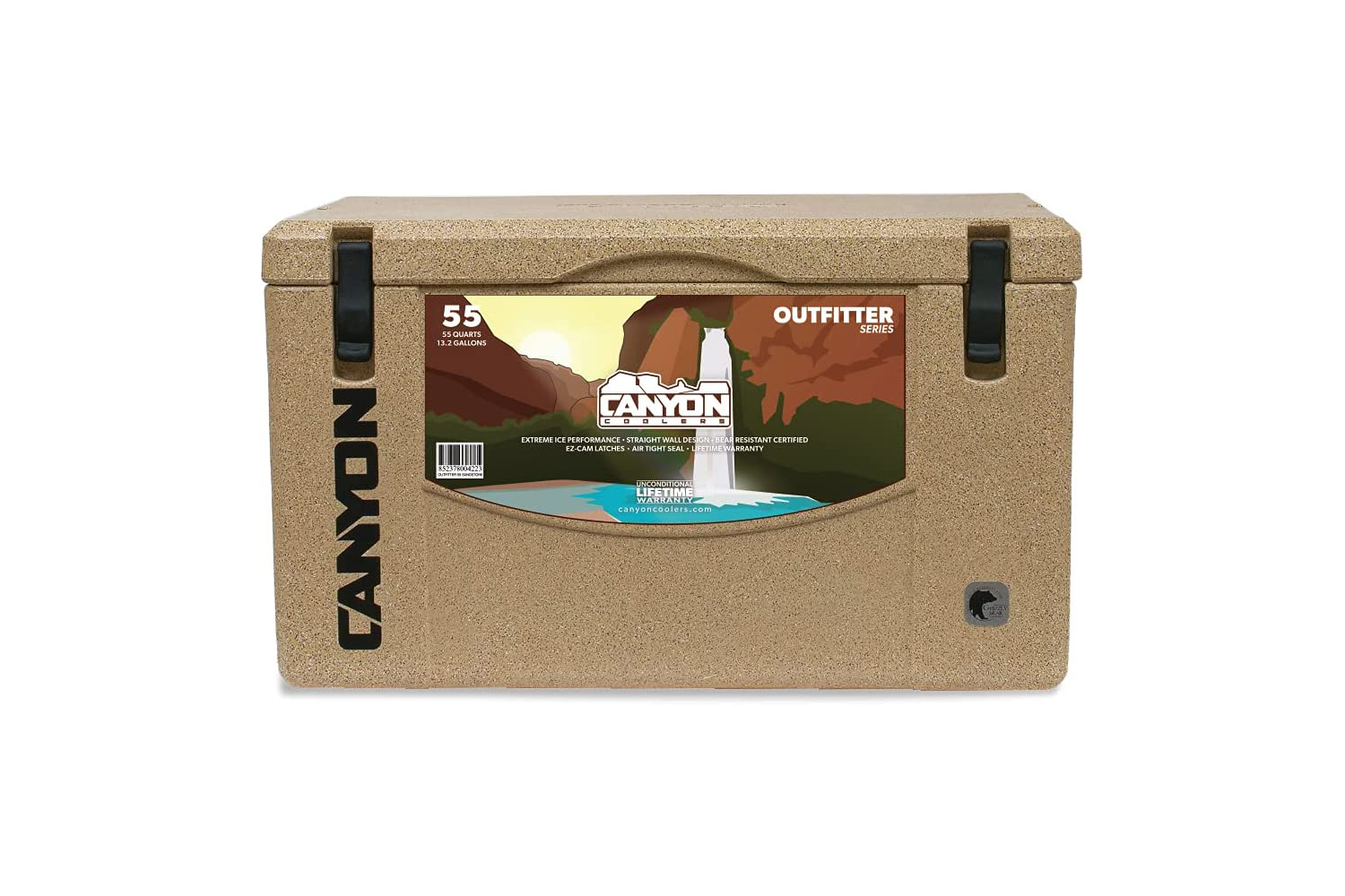 A brown Canyon Coolers Outfitter Rotomolded Cooler with a sticker of the brand on it.