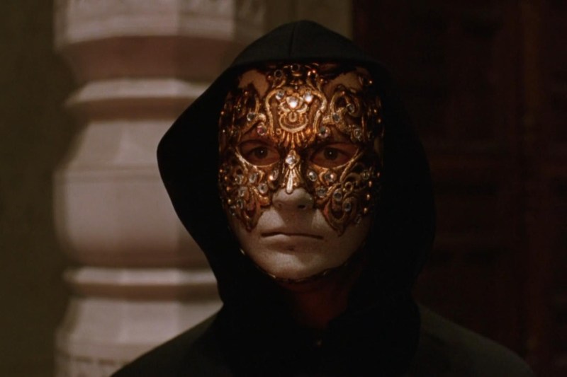 Scene featuring the iconic mask worn in the 1999 movie Eyes Wide Shut.