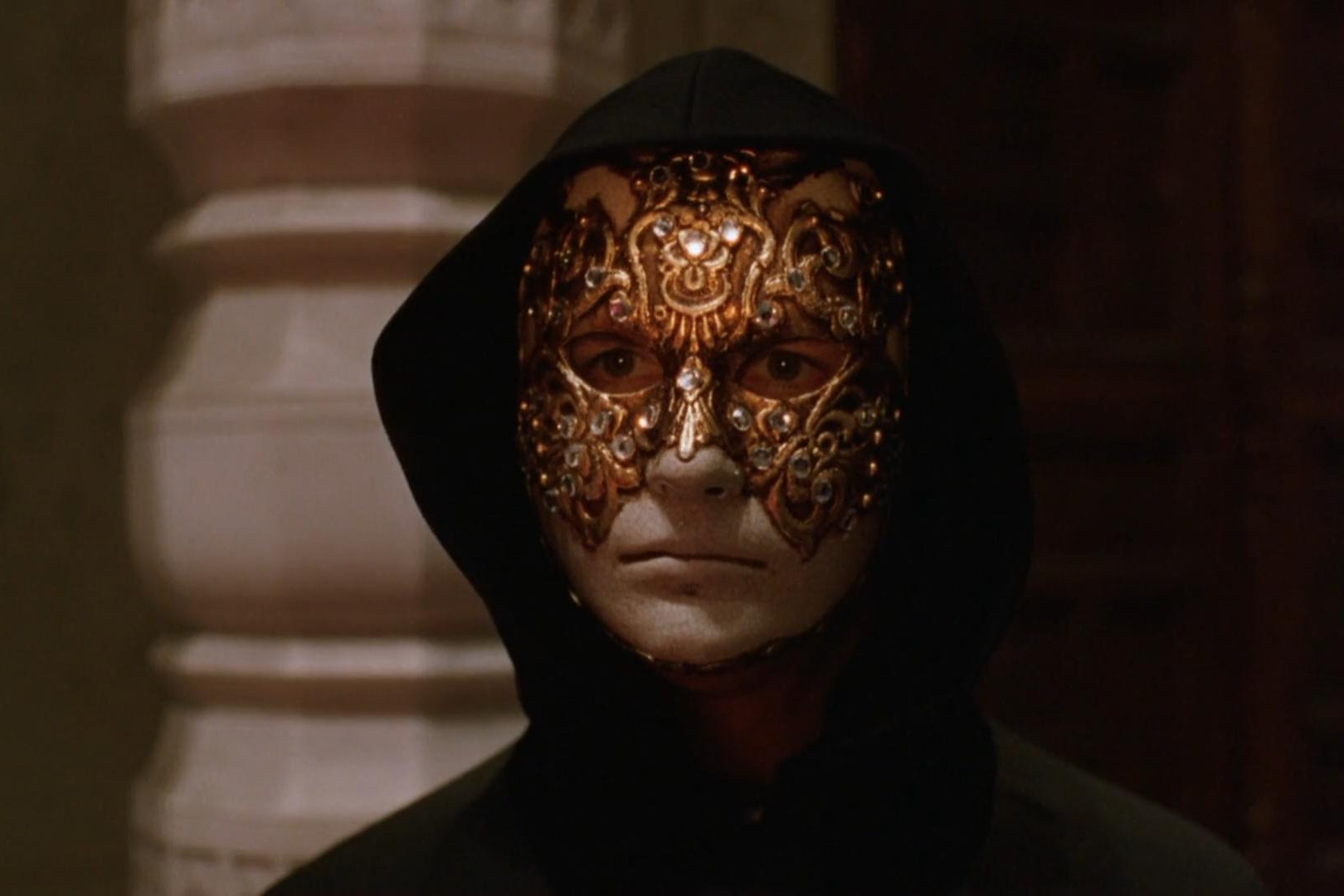 Scene featuring the iconic mask worn in the 1999 movie Eyes Wide Shut.