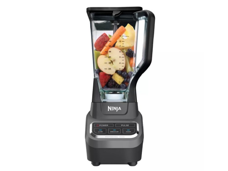 The 1,000-watt Ninja Professional Blender with fruits and vegetables inside.