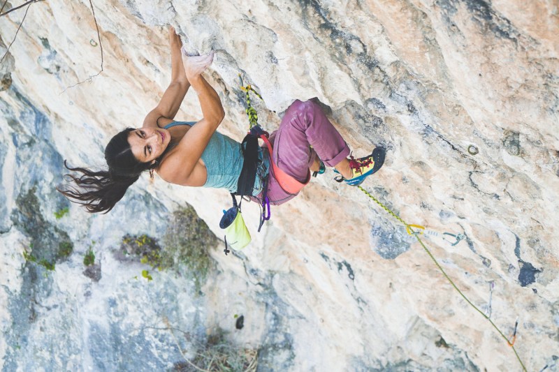 Woman rock climbing
