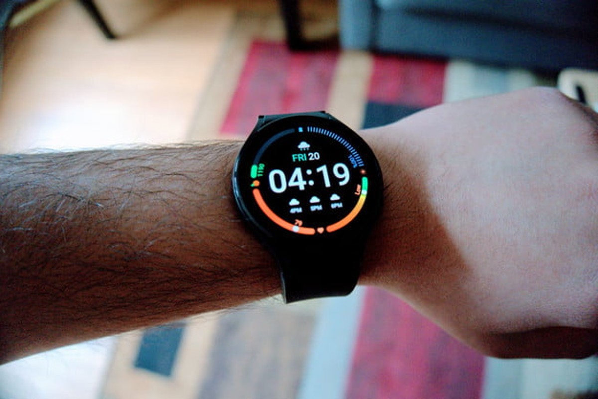 A man wearing the Samsung Galaxy Watch 4.