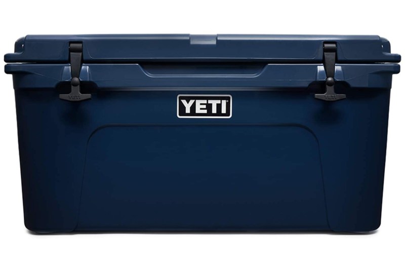 A navy Yeti Tundra 65 on plain background.