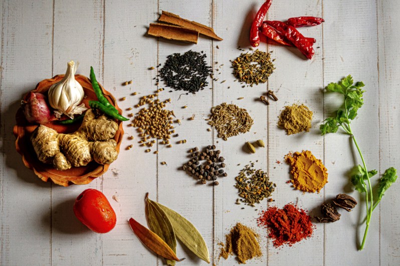 An array of Indian spices on the table.