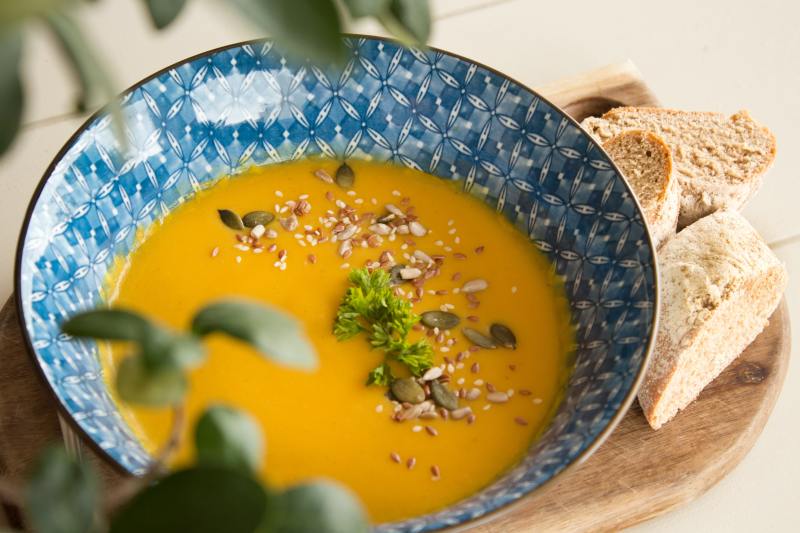 Vegan, gluten-free orange soup in a bowl.