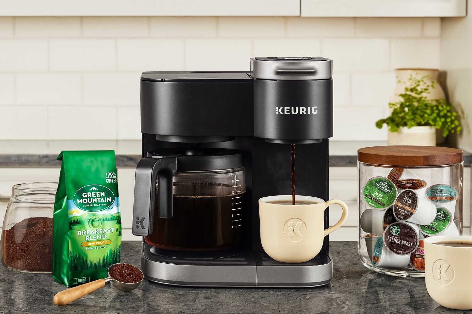 Keurig K-Duo Single Serve K-Cup Pod & Carafe Coffee Maker on a counter with coffee.