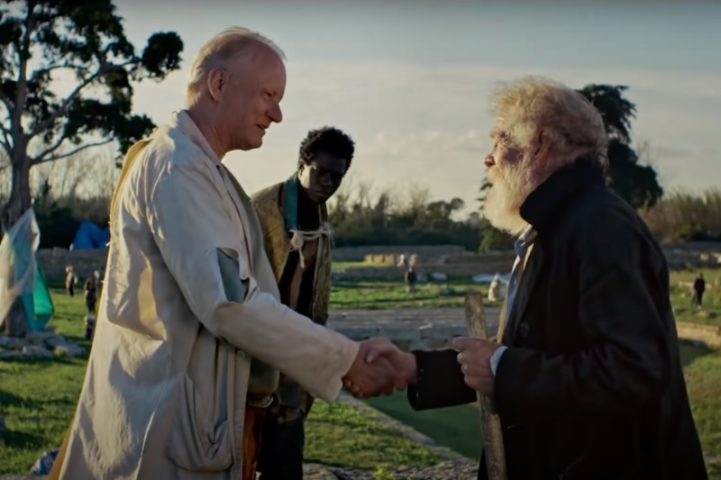 Kalipha Touray as Kal (center, rear) looks on as Stellan Skarsgård as Zyberski greets Nick Nolte as Shakespeare in 'Last Words.'