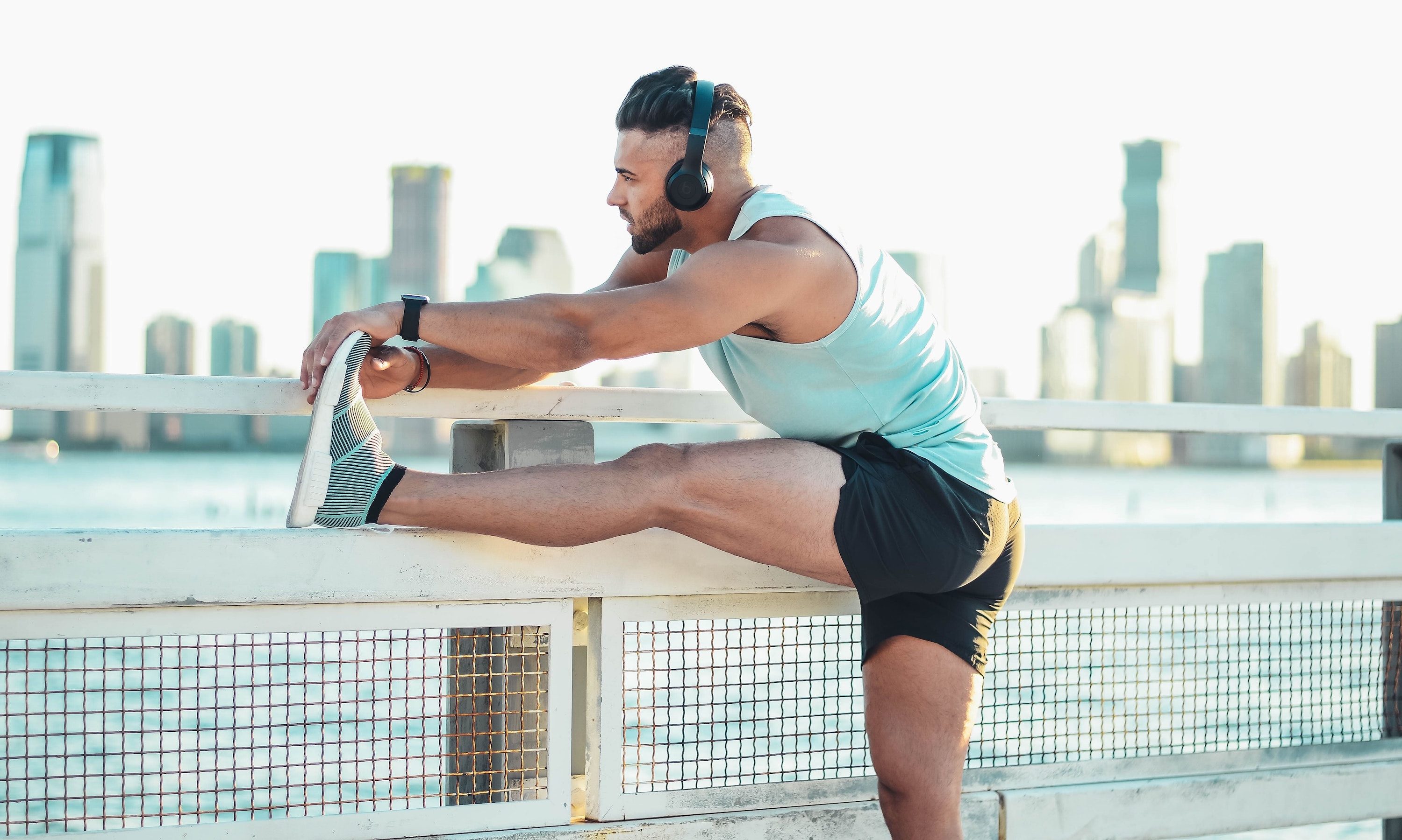 man stretching hamstring.