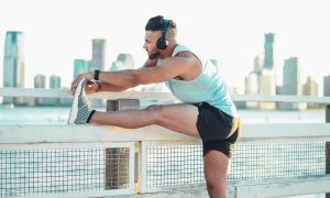 Man stretching his hamstrings