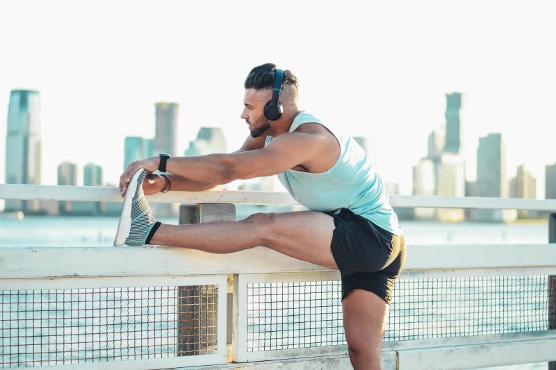 man stretching hamstring.