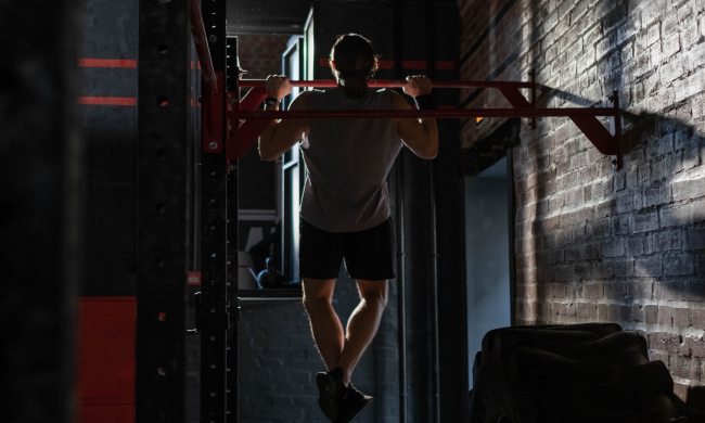 Man performing a pull-up.