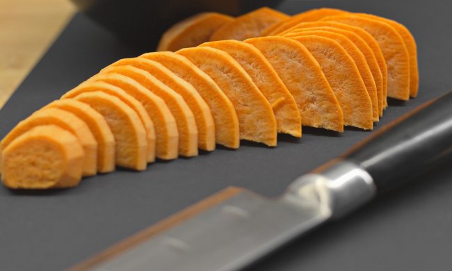 Sliced raw sweet potato.