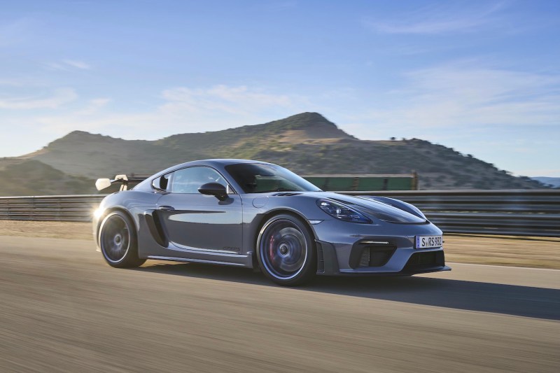 Porsche 718 Cayman GT4 RS on track front end from passenger's side.