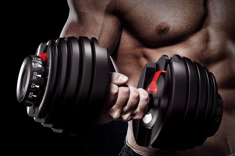 SKONYON Adjustable Dumbbell in use by model.