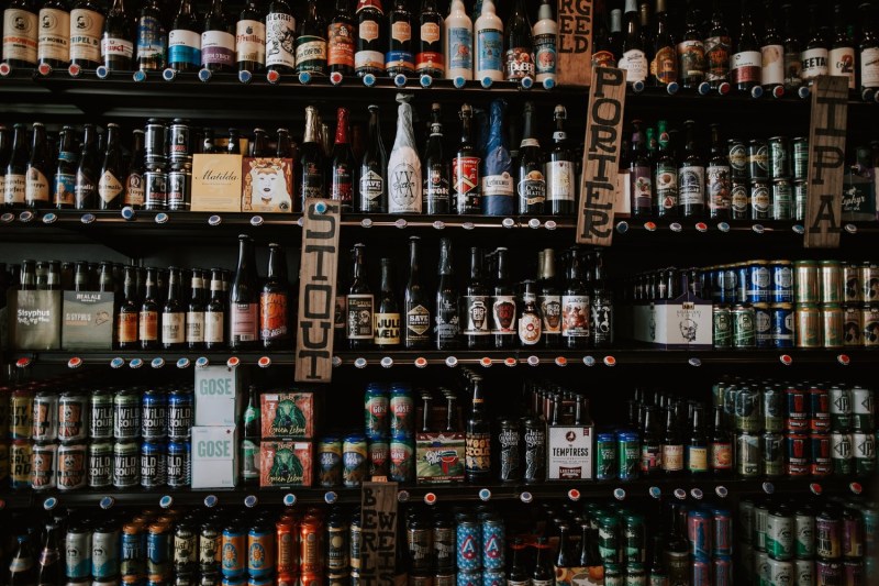 shelf of stout beer next to porter and ipa.