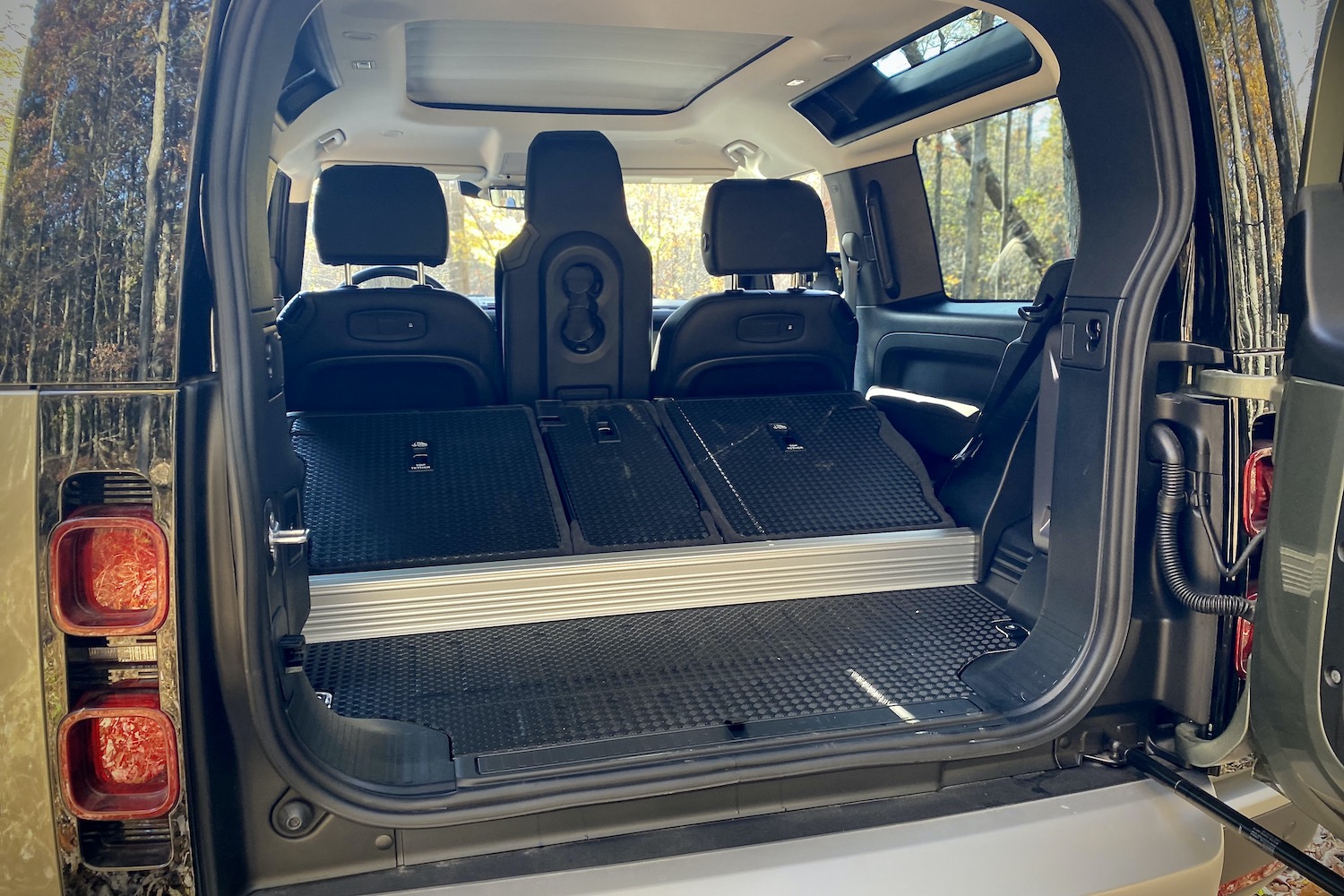 Cargo area in Land Rover Defender with rear seats folded.