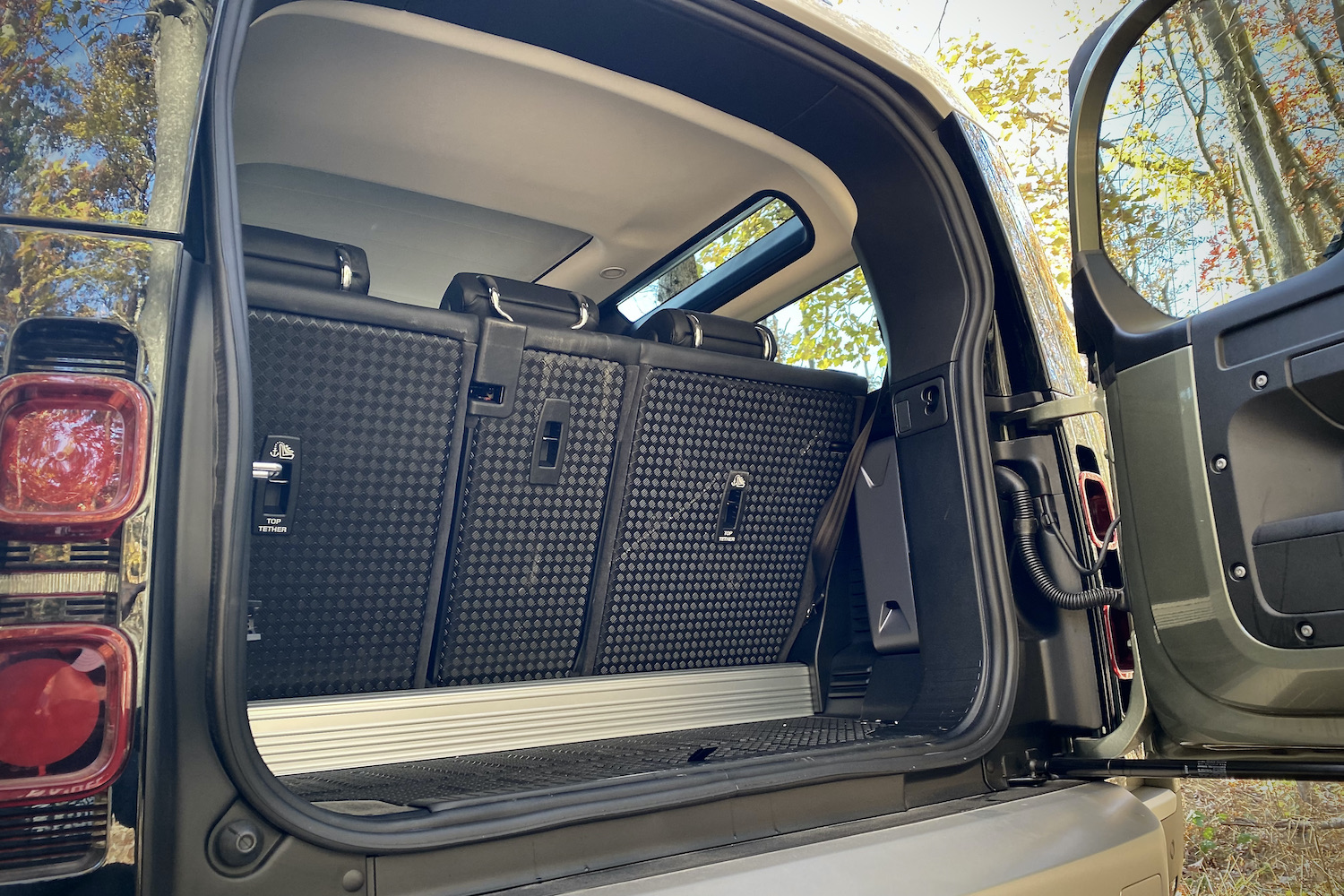 Cargo area in Land Rover Defender with rear seats in place.
