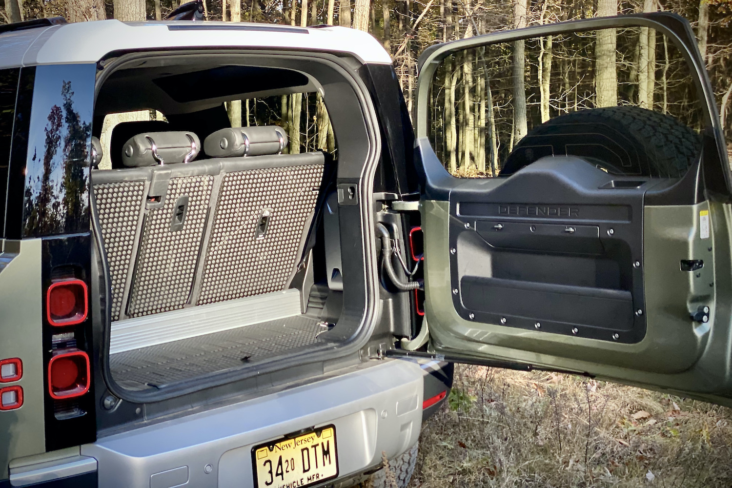 Close up of Land Rover Defender cargo area with swing-out liftgate.