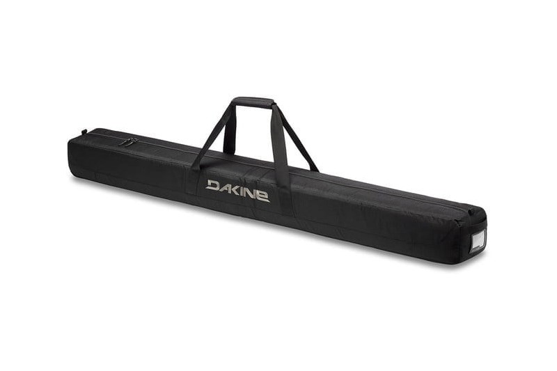 Dakine Padded Ski Sleeve isolated on a white studio background.