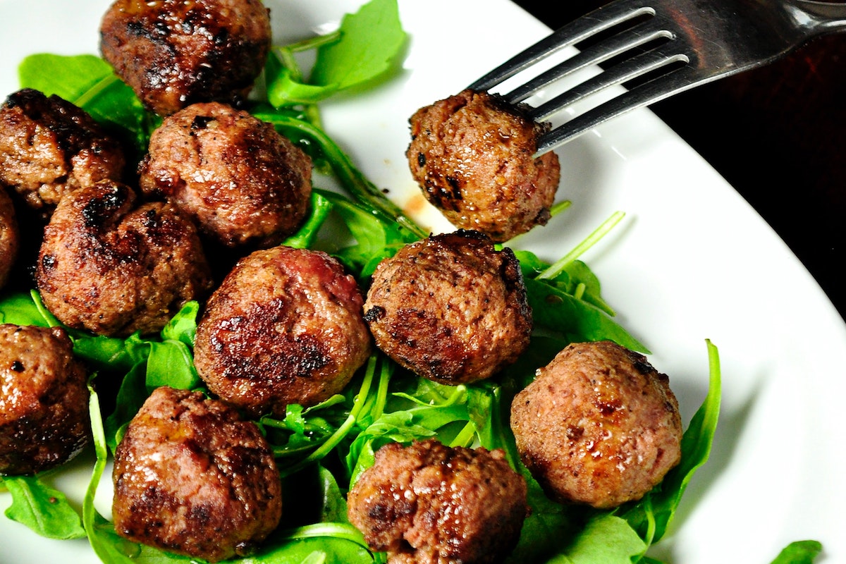 Meatballs on spinach.