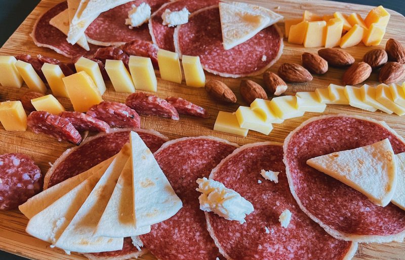 charcuterie board with meats and cheeses.