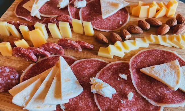 An array of meats and cheeses.