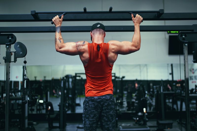 man doing pull-ups.