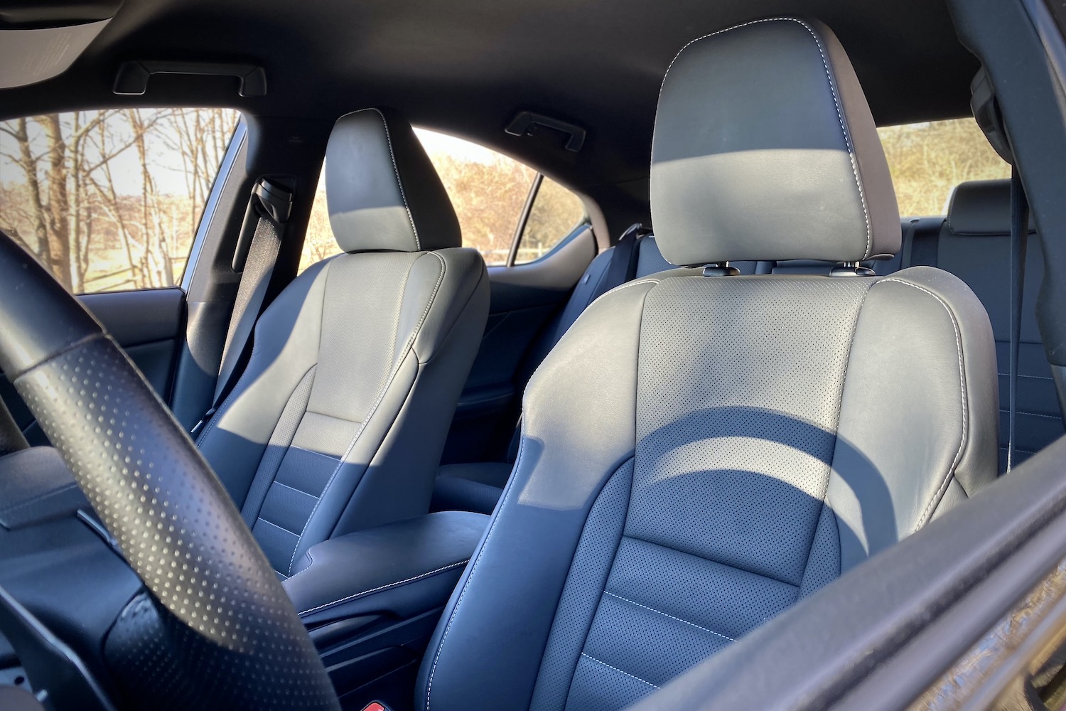 Lexus IS 500 front seats from driver's side.