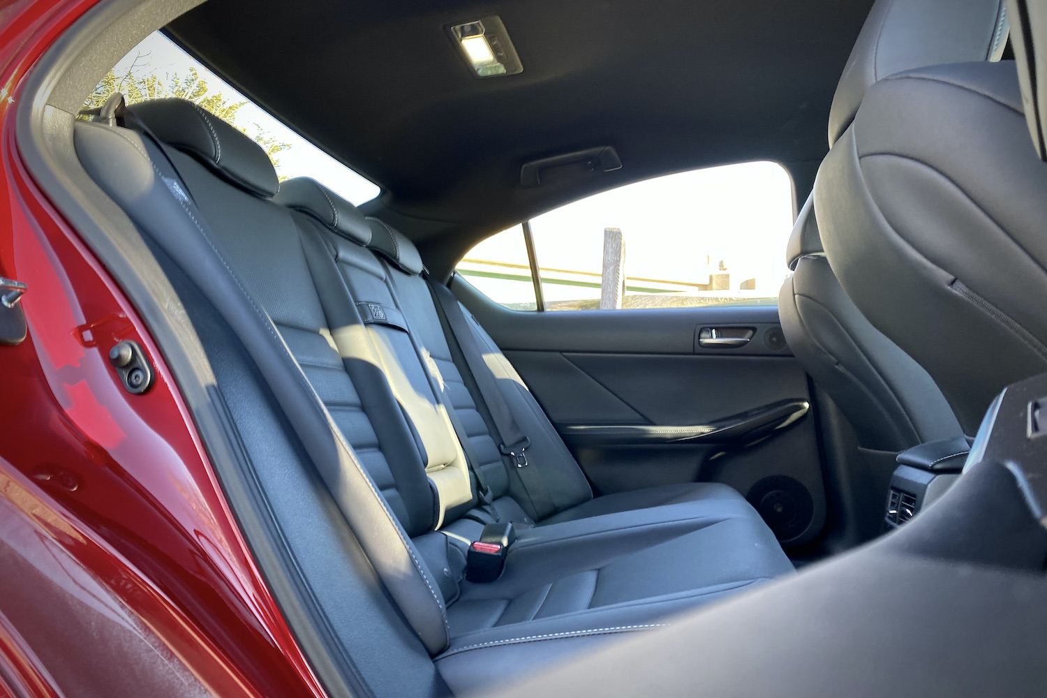 Side view of rear seats in Lexus IS 500 from passenger's side.