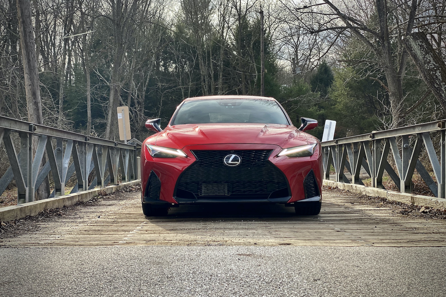 Lexus IS 500 front end on a bridge.