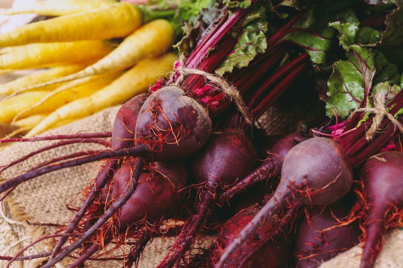 Raw red and yellow beets.