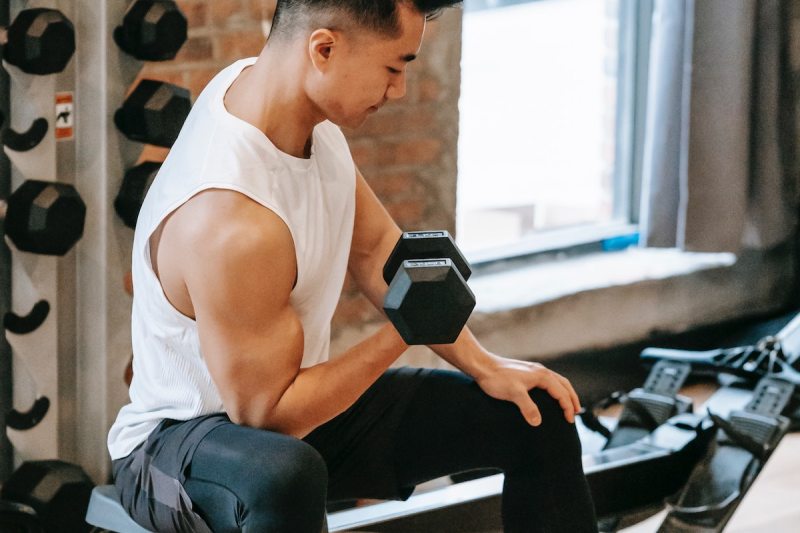 Man doing curls.
