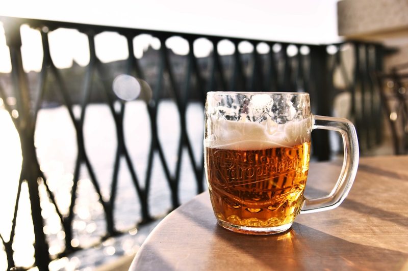Mug of beer outside on a table