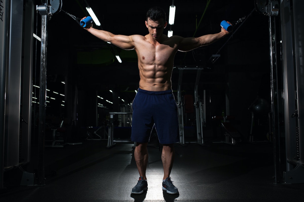 Man doing cable exercises