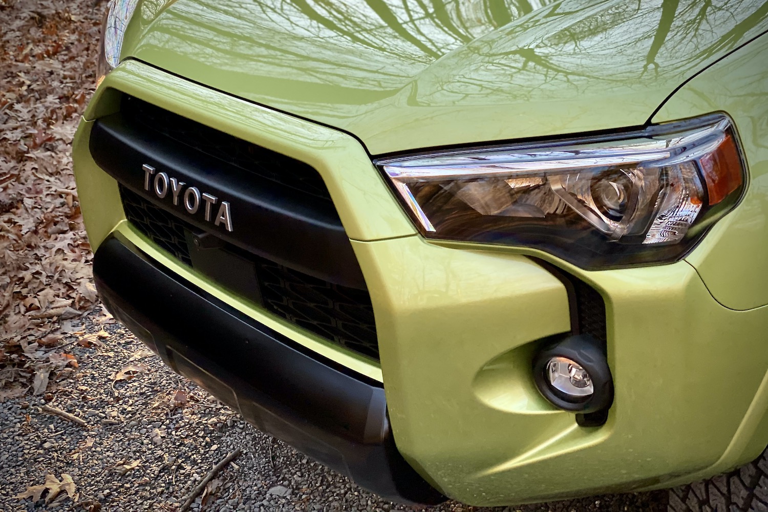 Close up of front end of Toyota 4Runner TRD Pro on a gravel path.