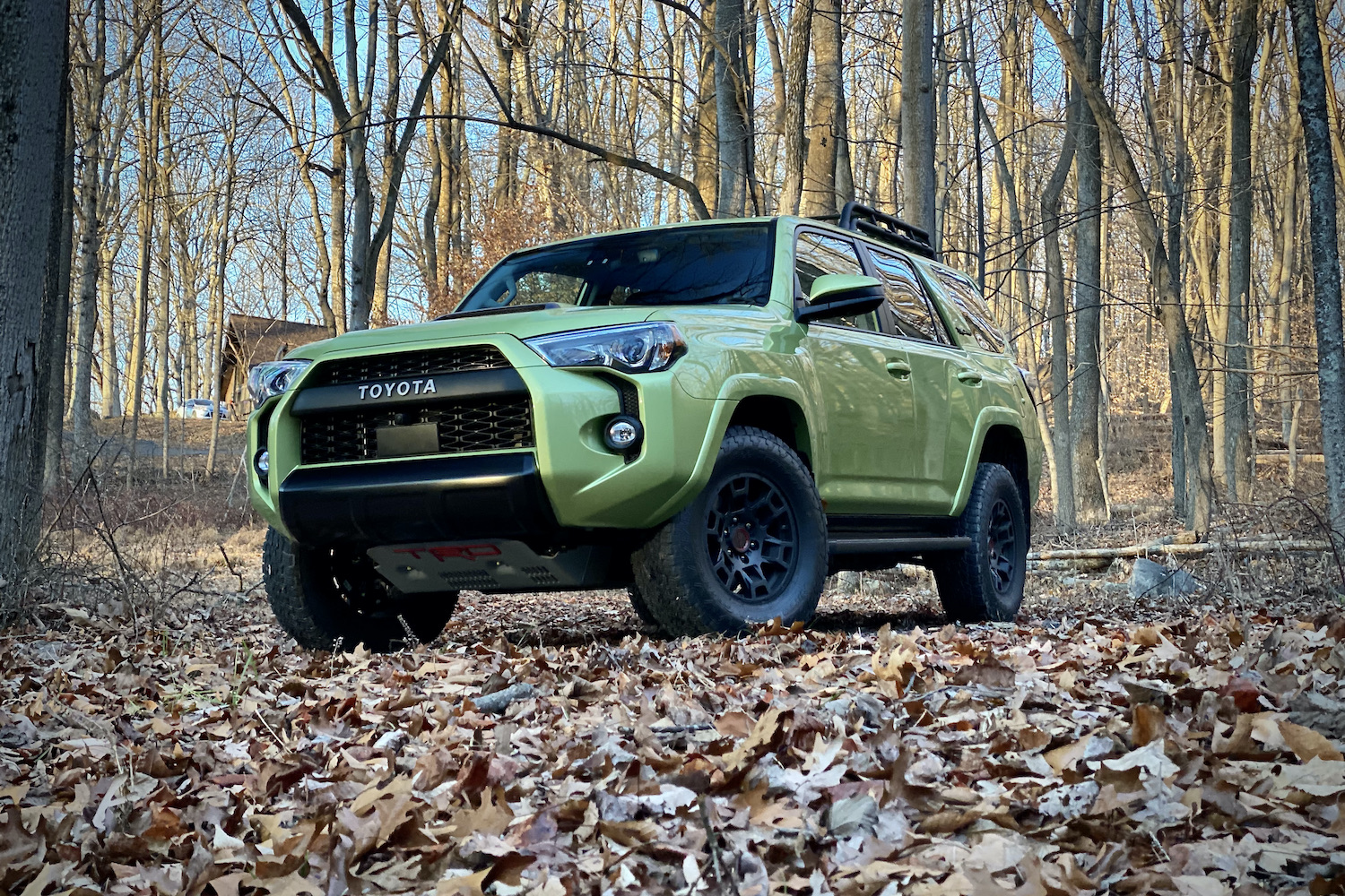 Angle front end of Toyota 4Runner TRD Pro with trees in the back.