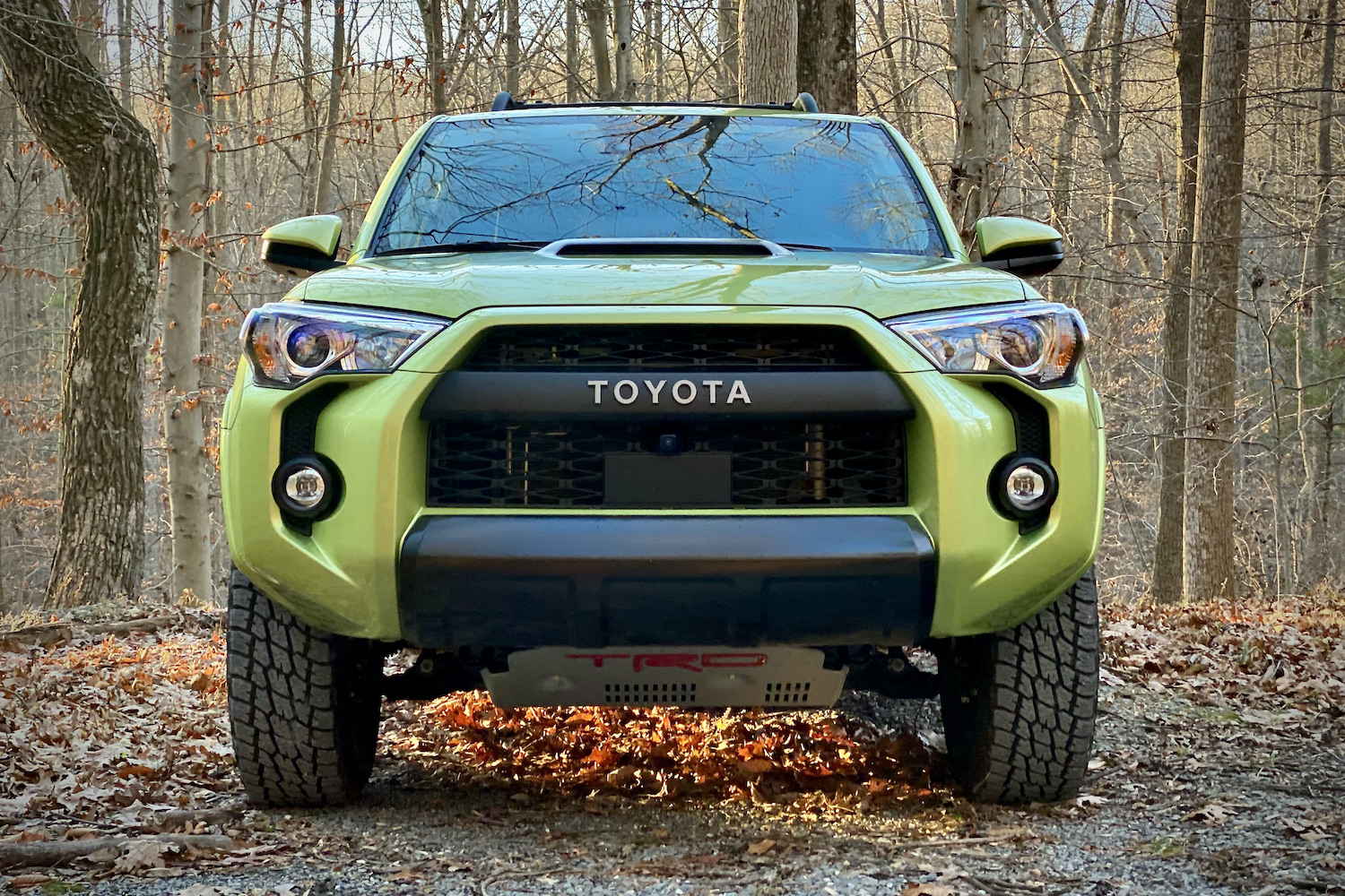 Front end of Toyota 4Runner TRD Pro with trees in the back.